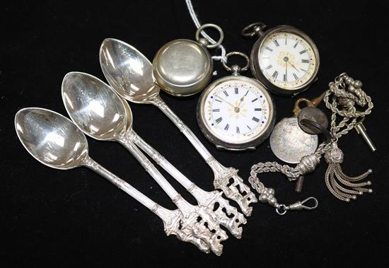 A set of four silver coffee spoons, two silver fob watches and a sovereign case